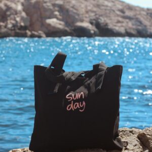 Cabas brodé Sun Day en coton noir avec poche intérieure et fermeture aimantée